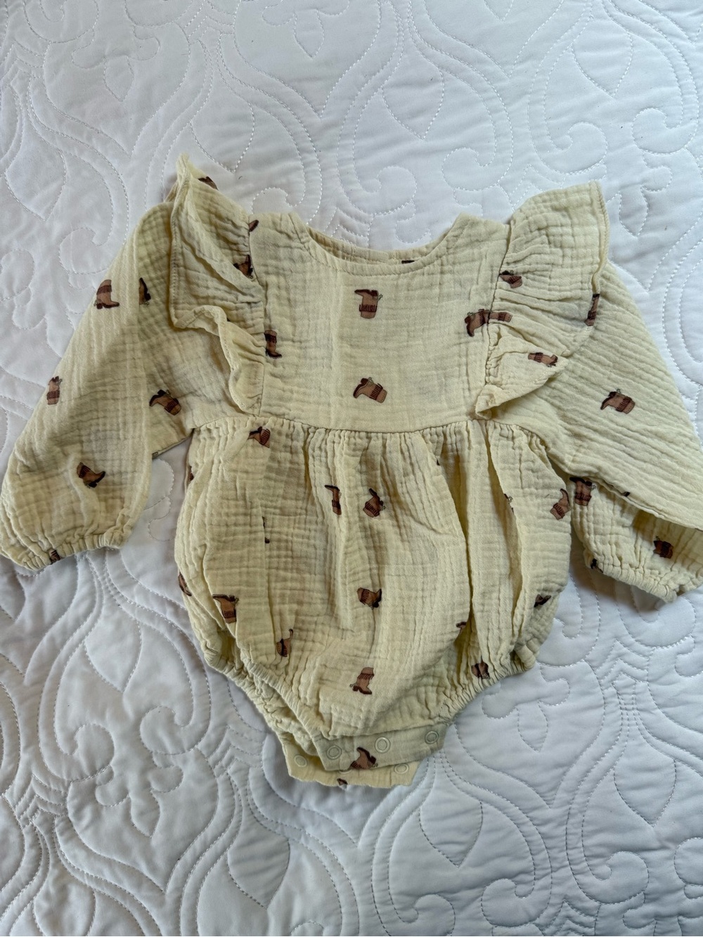 Rylee + Cru Cream Muslin Ruffled Baby Romper with Brown Boot Prints